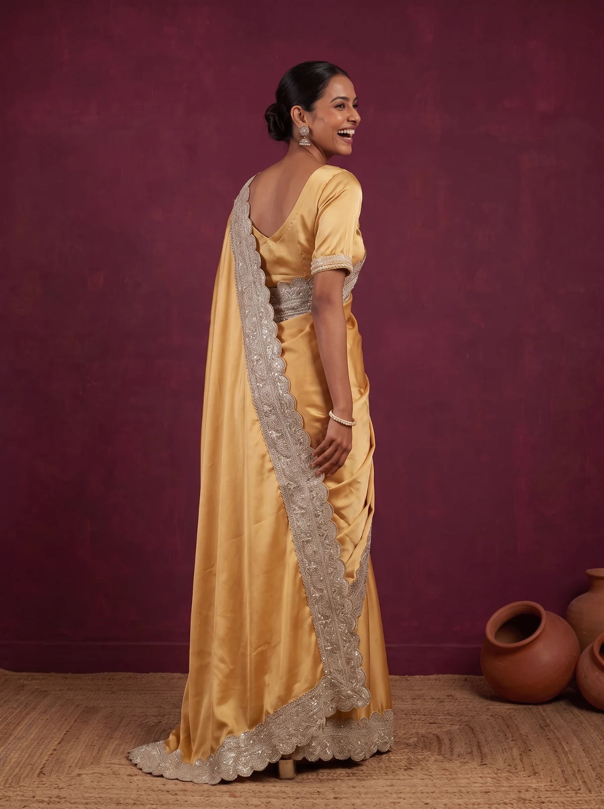 Golden satin saree, back