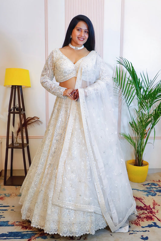 Ethereal off-white bridal net lehenga from House of Daisy