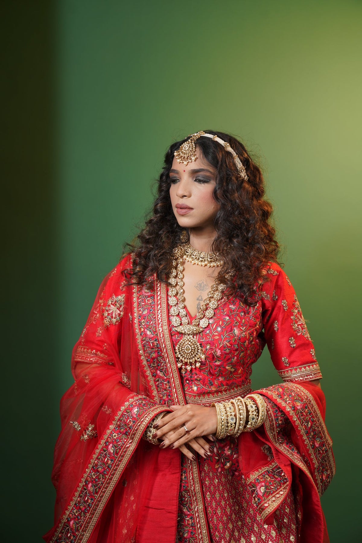 Red silk bridal lehenga from House of Daisy