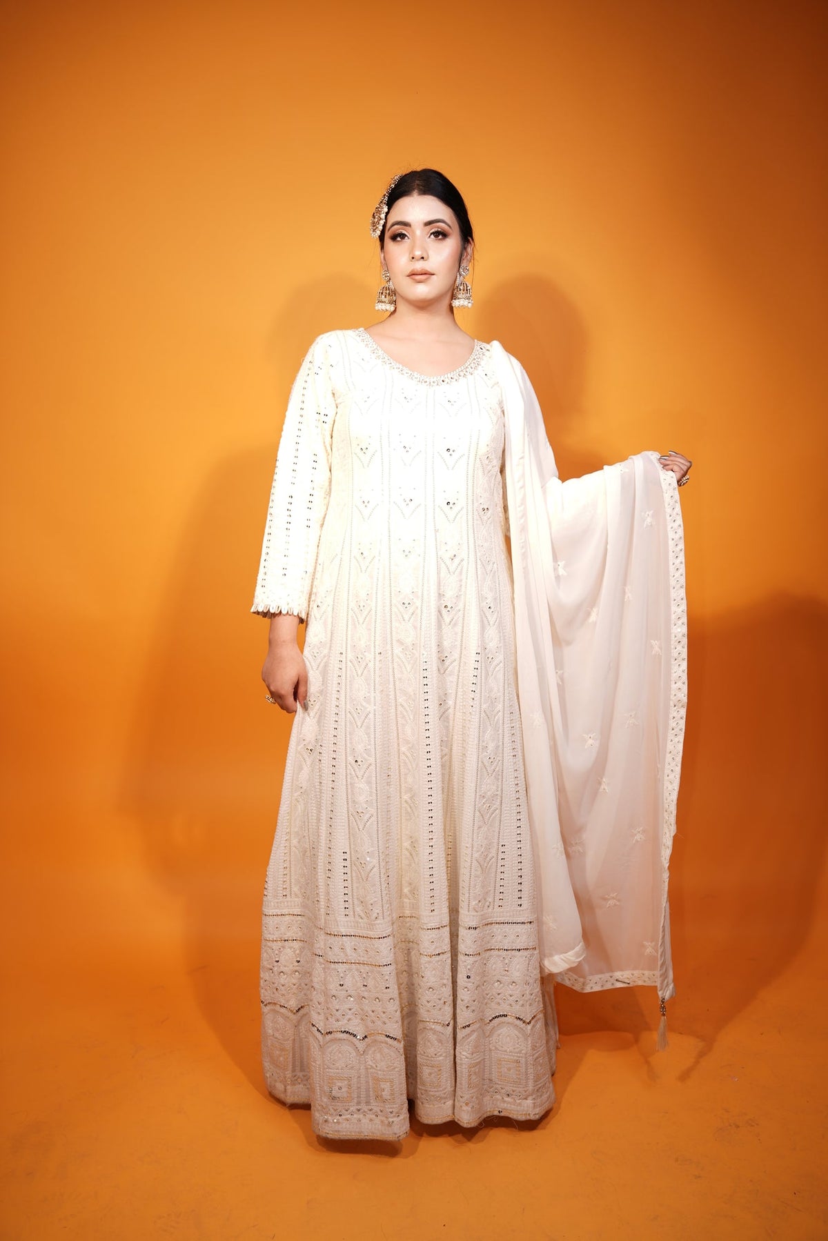 Floor-length frock style suit from House of Daisy