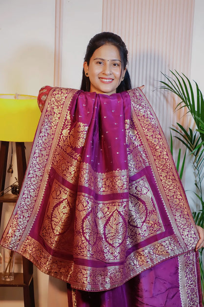 Royal purple silk saree, pallu held open to show the zari weave