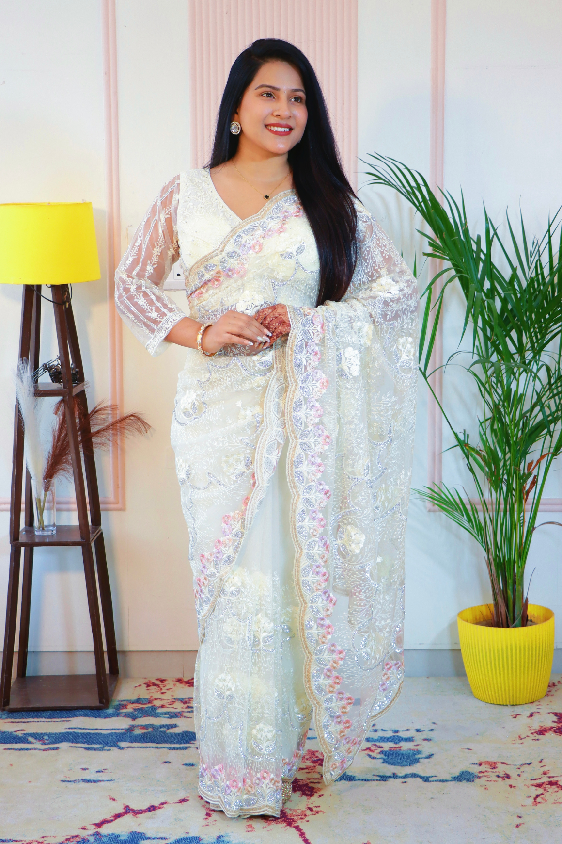 Elegant Cream Net Embroidered Saree