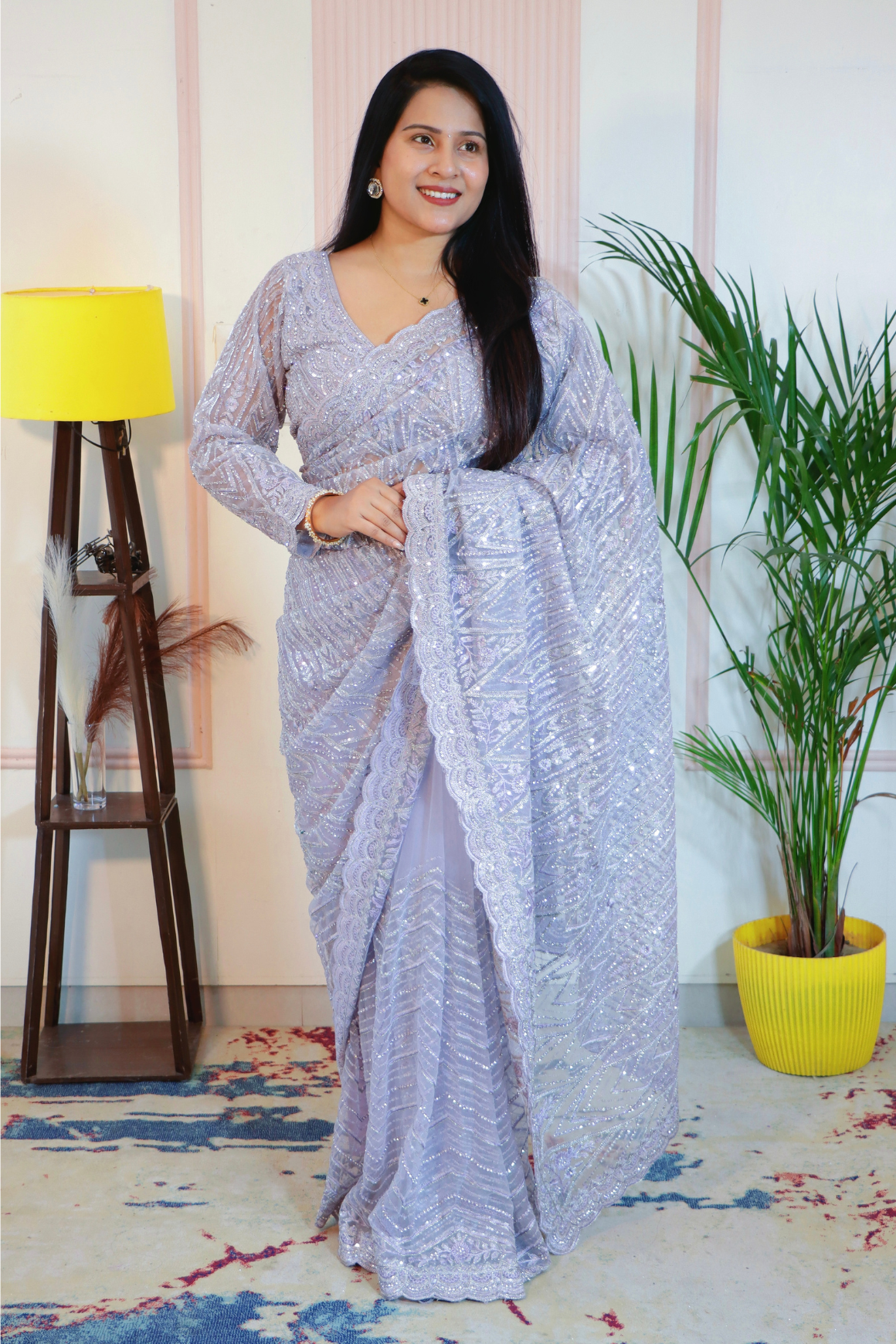 Elegant Lavender Pink Net Saree