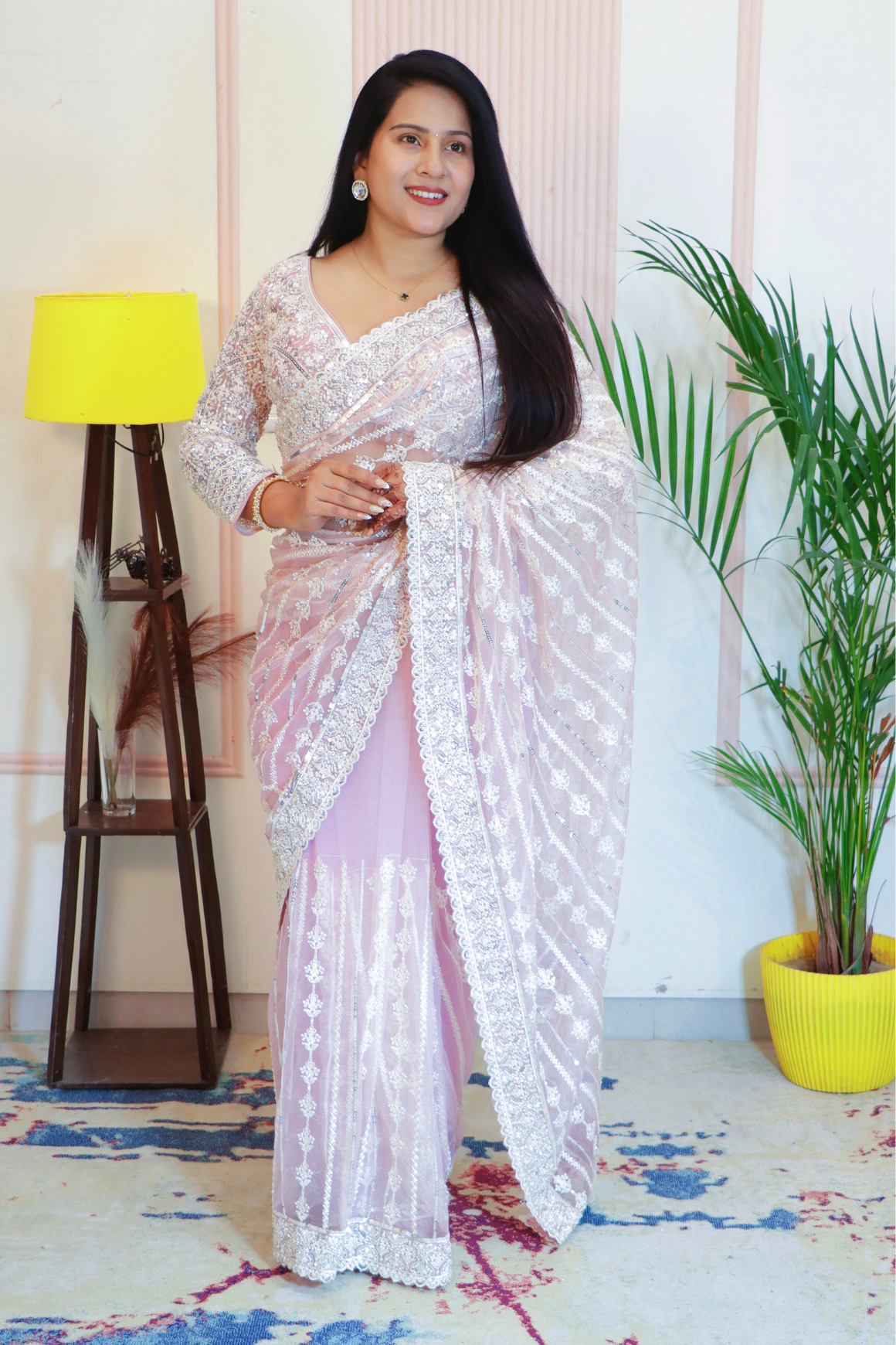 Elegant Pink Net Embroidered Saree