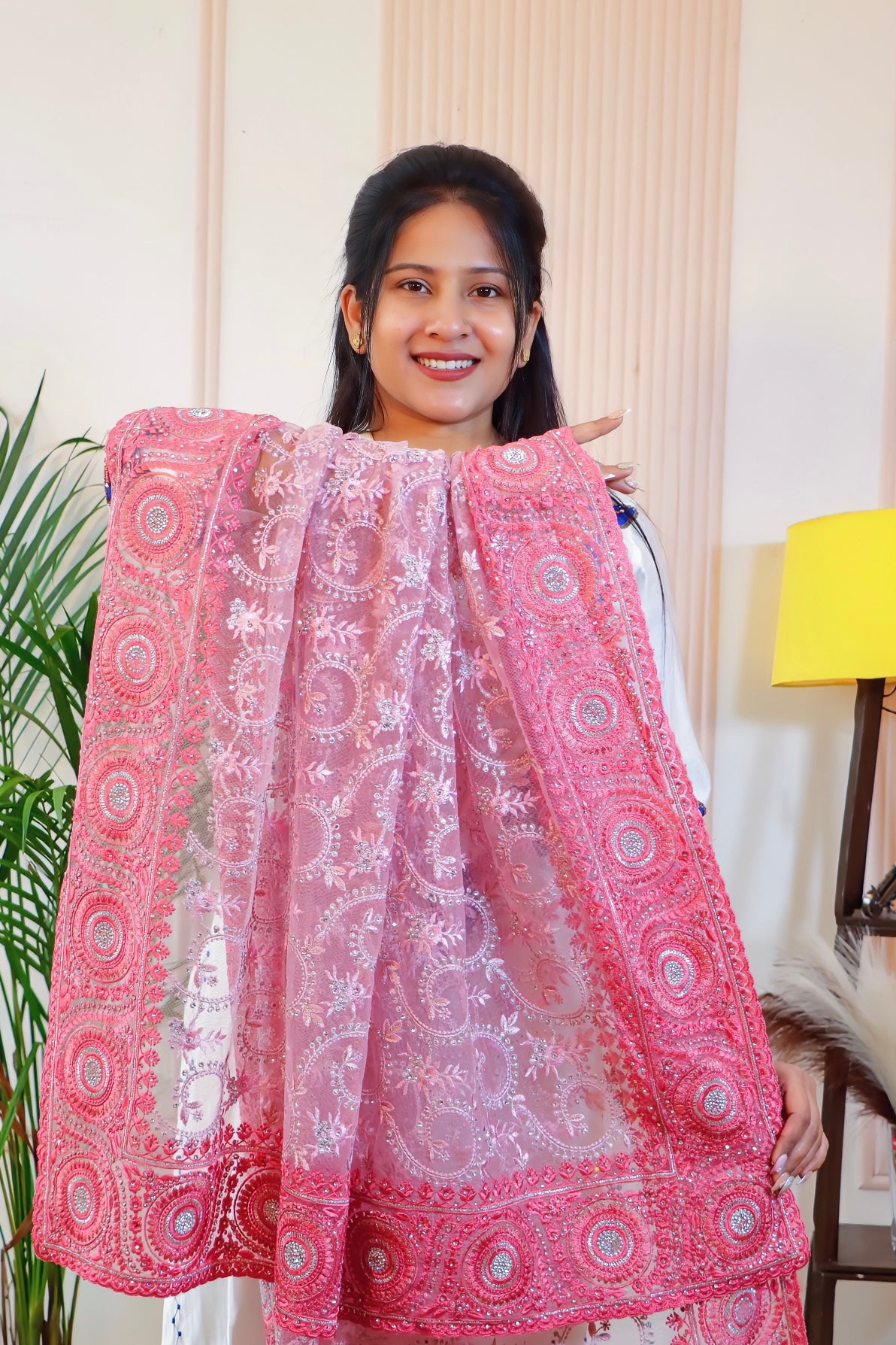 Graceful Pink Net Embroidered Saree