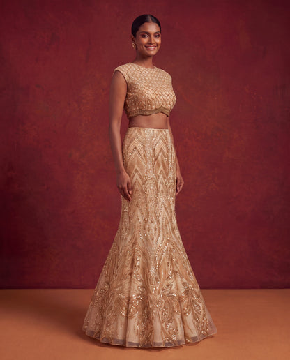 Golden bead work mermaid lehenga, three-quarter view