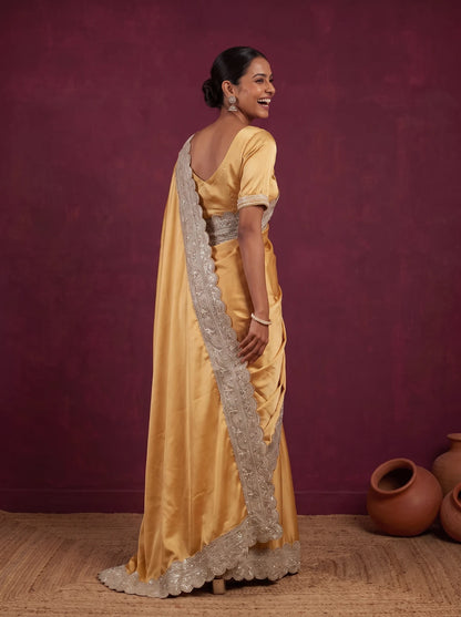 Golden satin saree, back
