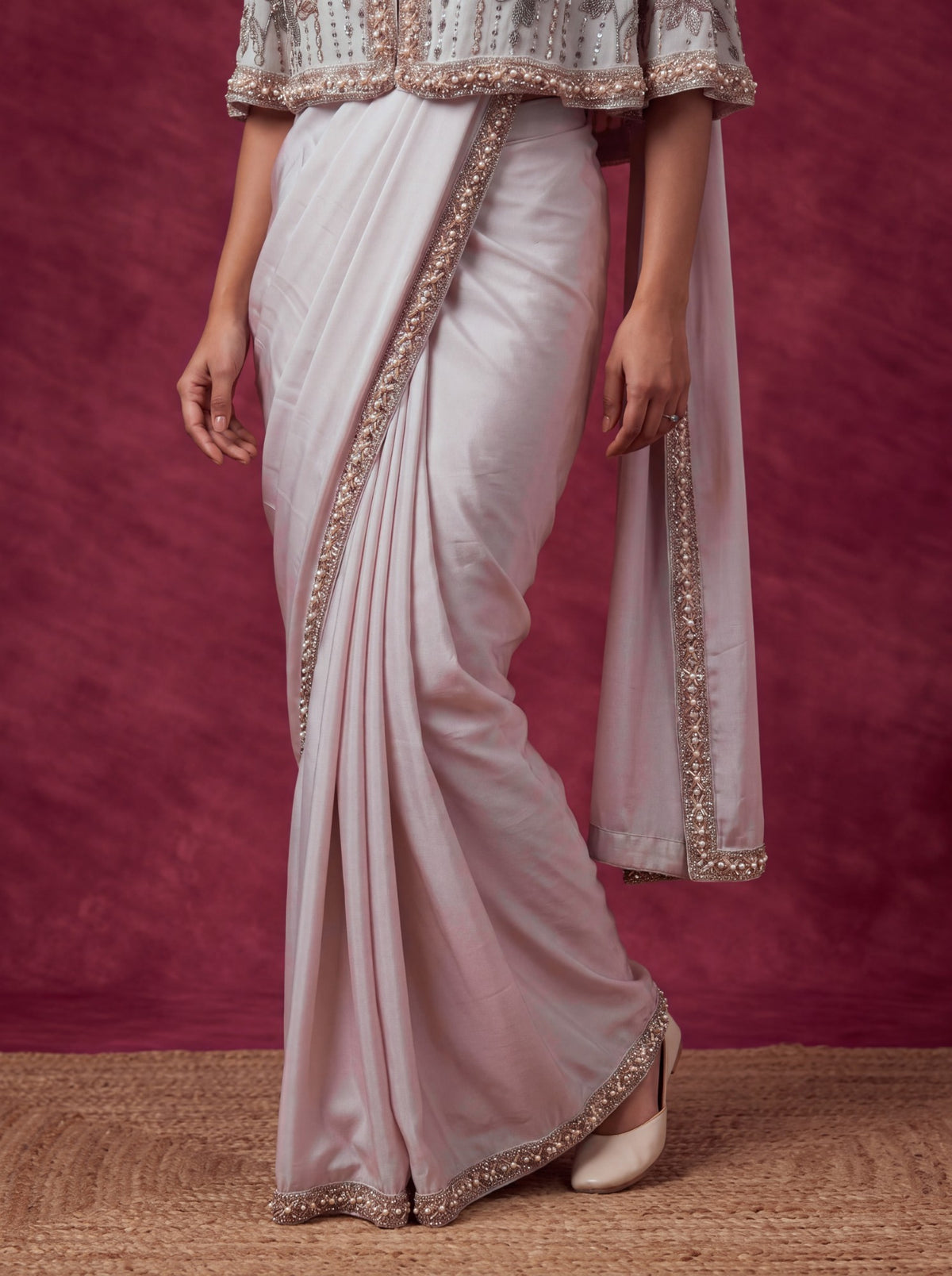 Heavenly pink saree drape with pearl border