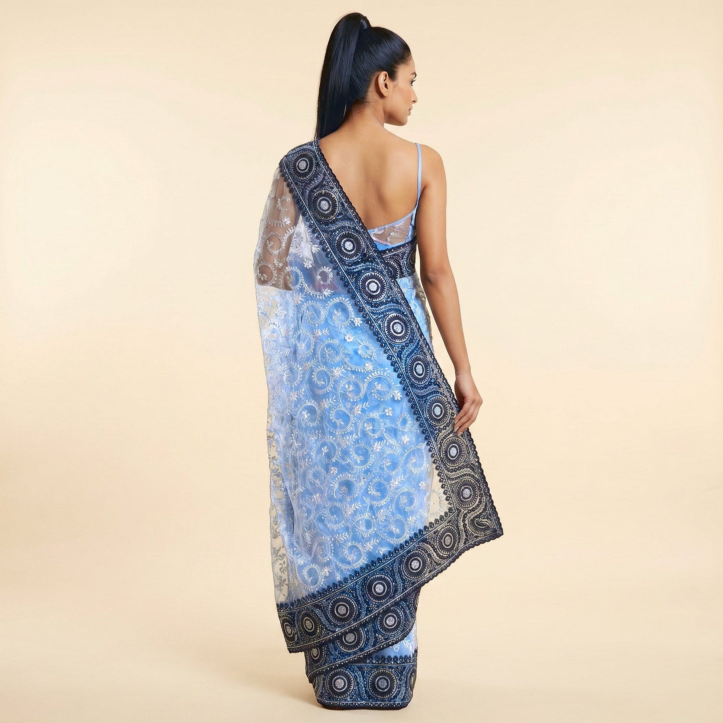 Graceful Grey Black Net Embroidered Saree on model - back