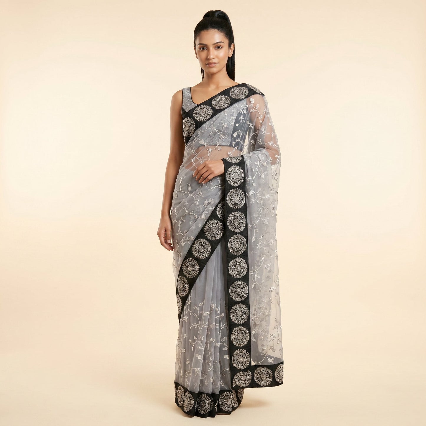 Graceful Grey Black Net Embroidered Saree on model - front