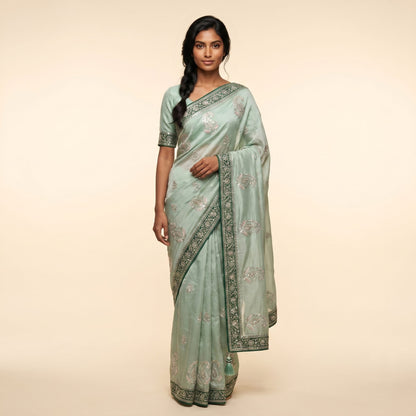 Elegant Mint Green Embroidered Saree on model - detail