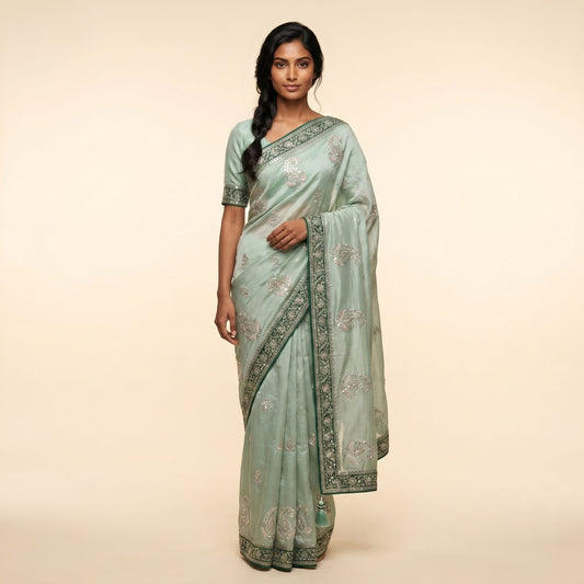Elegant Mint Green Embroidered Saree on model - detail