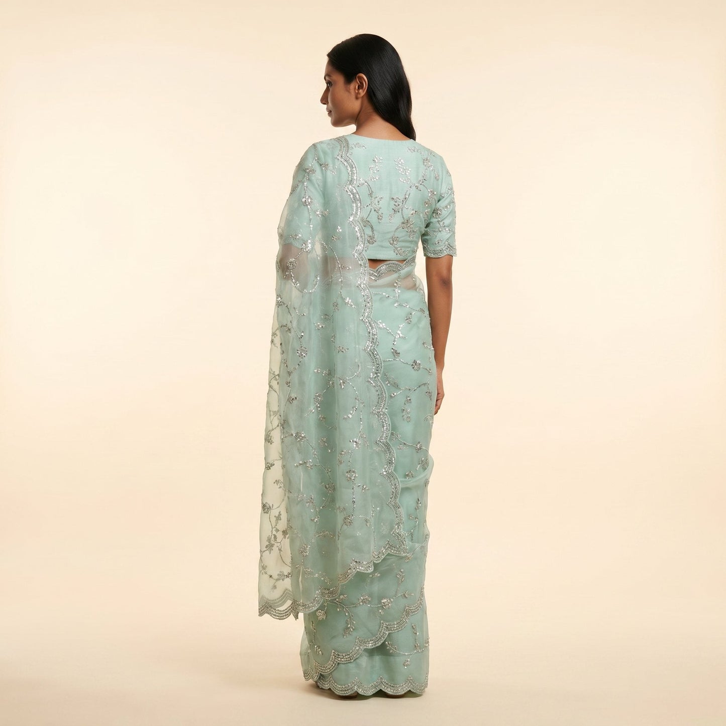 Mint Green Organza Silk Saree on model - back