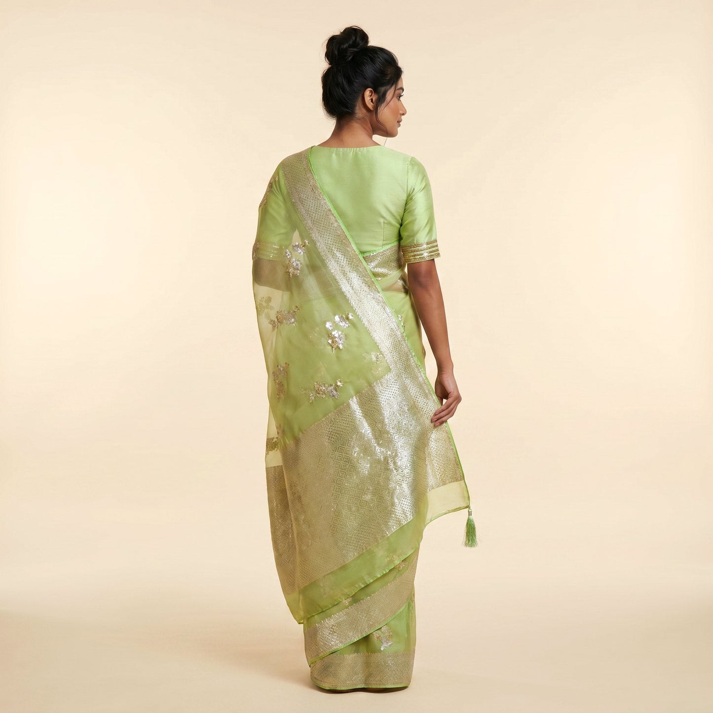 Pista Green Silk Saree on model - back