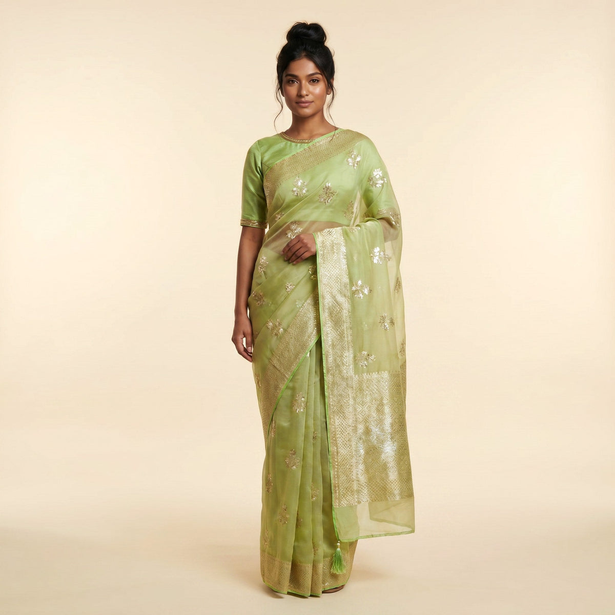 Pista Green Silk Saree on model - front