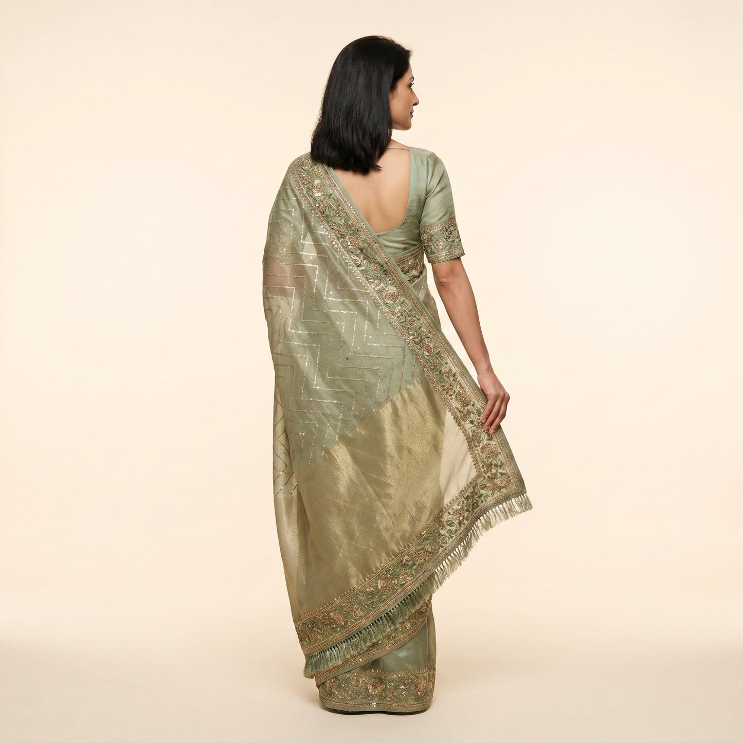 Sage-green tissue shimmer saree on model - back