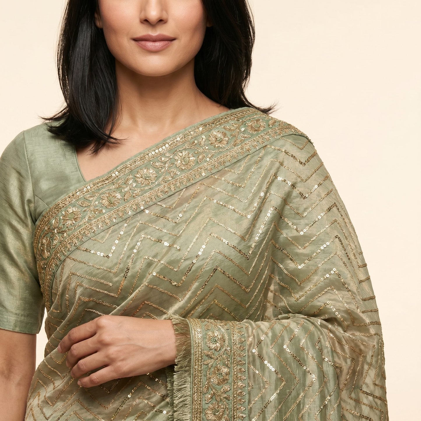 Sage-green tissue shimmer saree on model - detail
