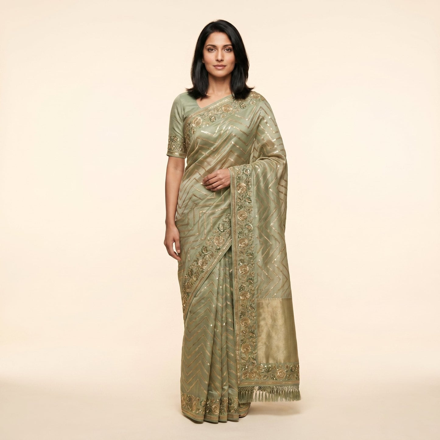 Sage-green tissue shimmer saree on model - front