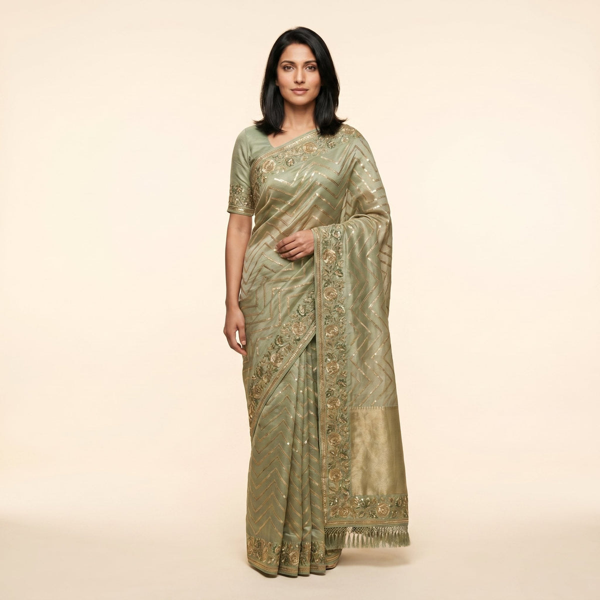Sage-green tissue shimmer saree on model - front