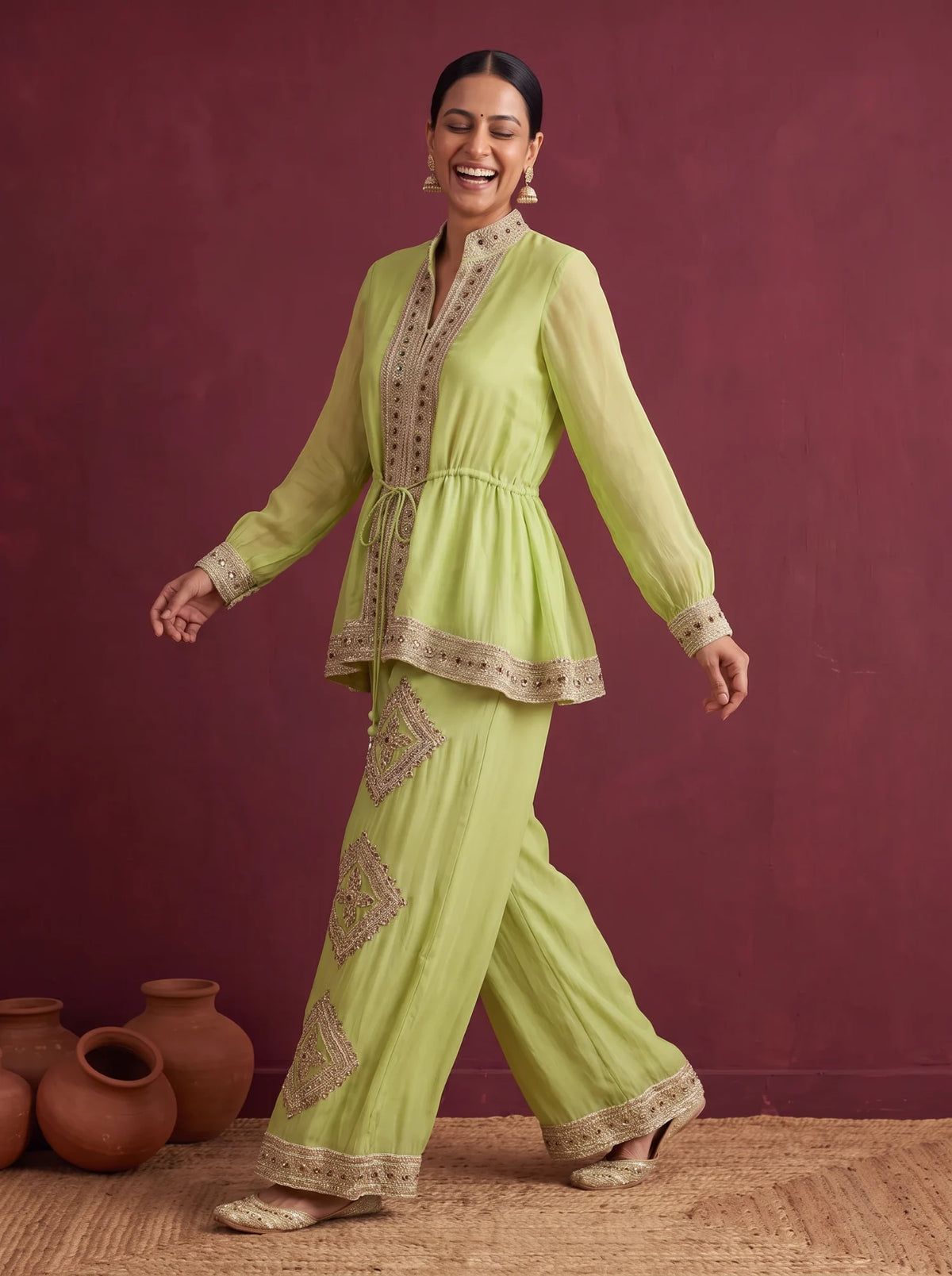 Lime green organza zardozi co-ord set, walking, with the leg motifs