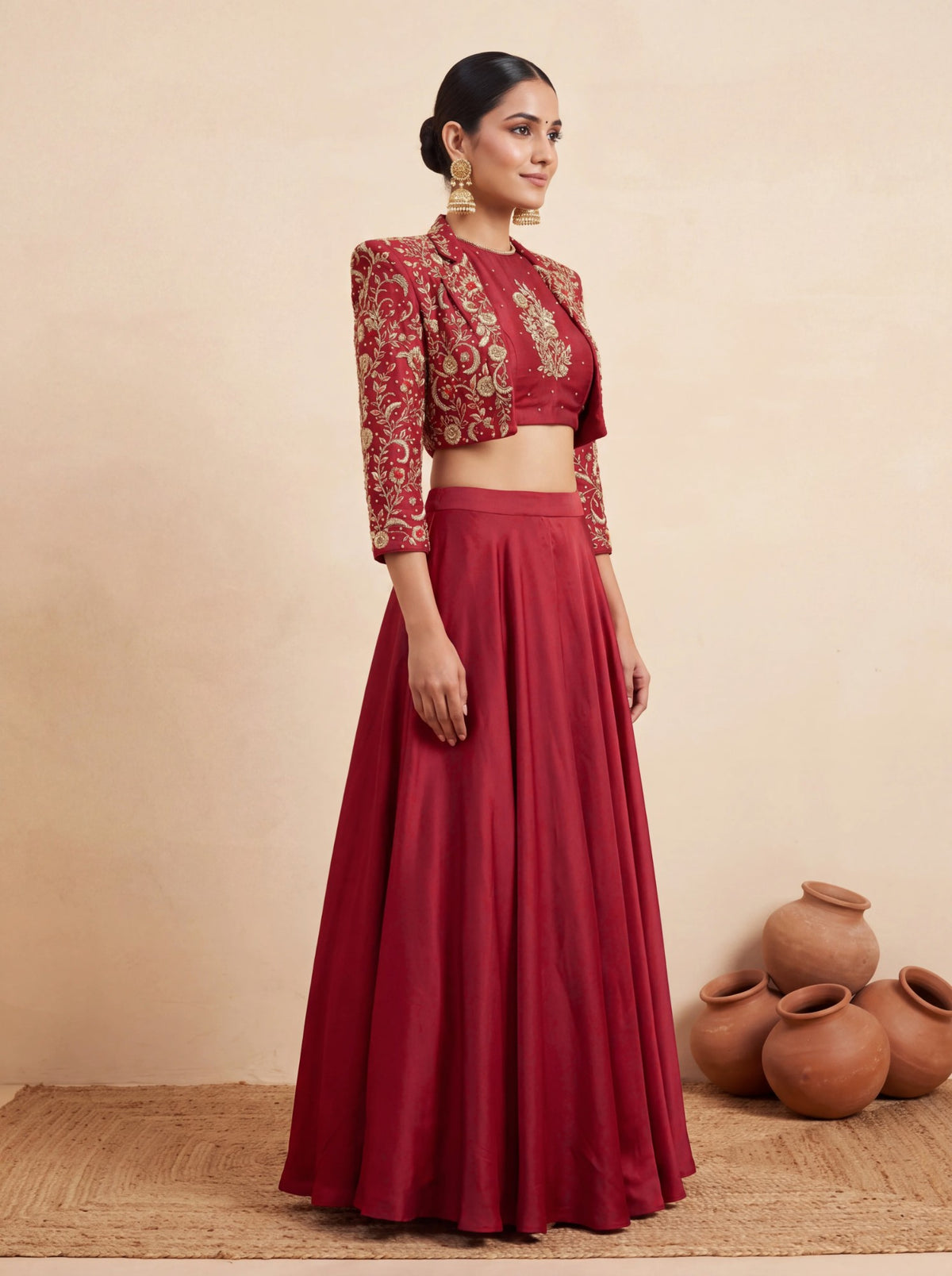 Maroon lehenga with cropped jacket, side view