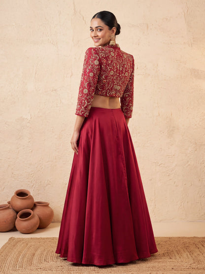 Maroon lehenga with cropped jacket, back