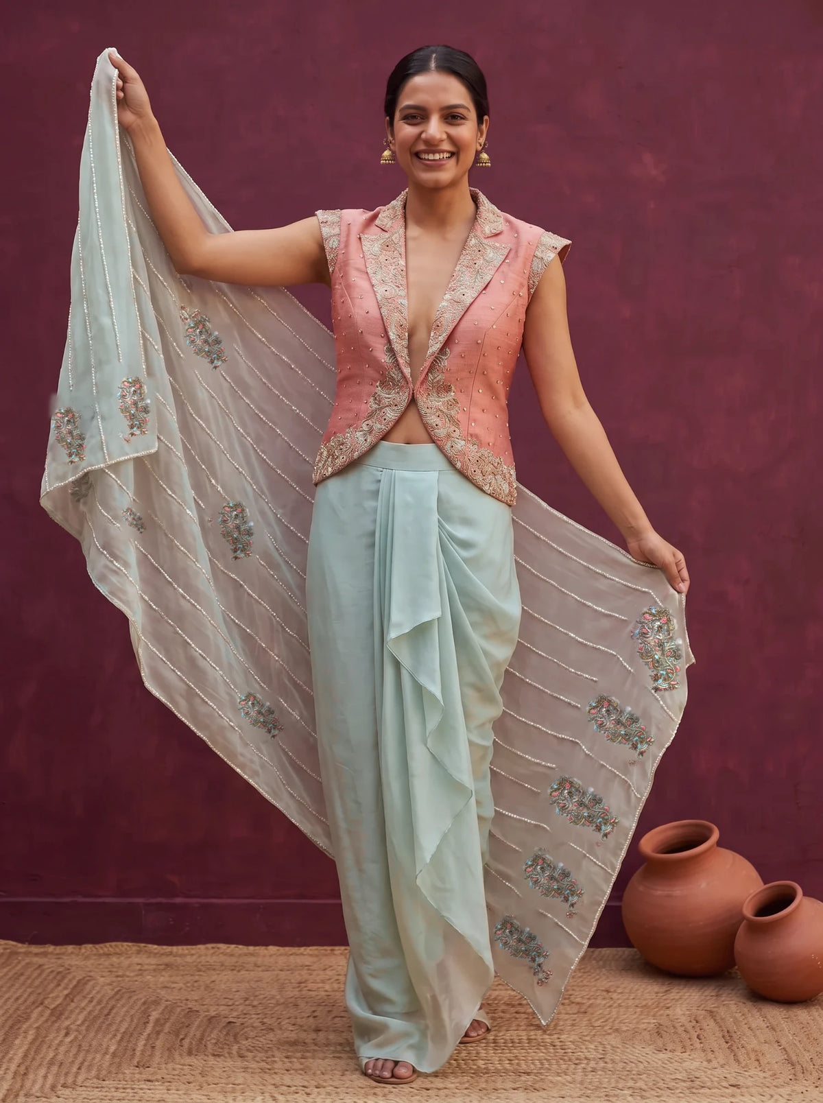 Mint green and peach orange skirt-jacket set, palla held open