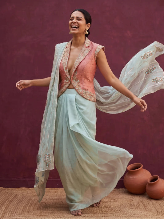Mint green and peach orange skirt-jacket set, in movement