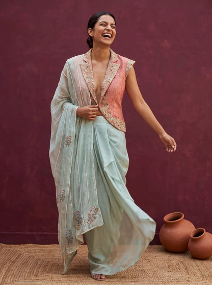 Mint green and peach orange skirt-jacket set, palla over the shoulder