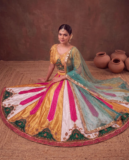 Multicolour lehenga, seated, hem embroidery