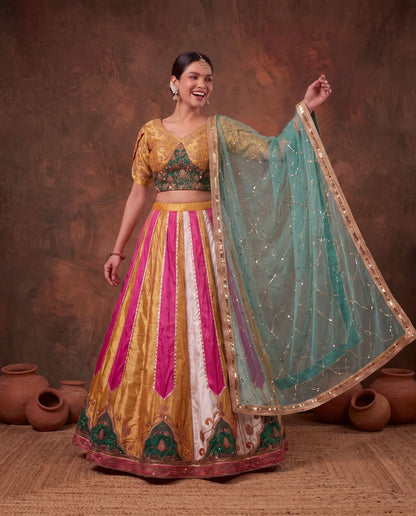 Multicolour lehenga, organza dupatta held open