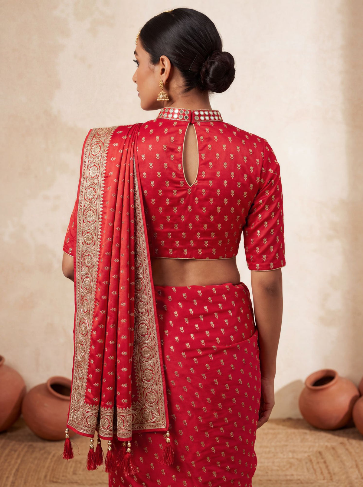 Red Banarasi brocade saree, pallu with tassels