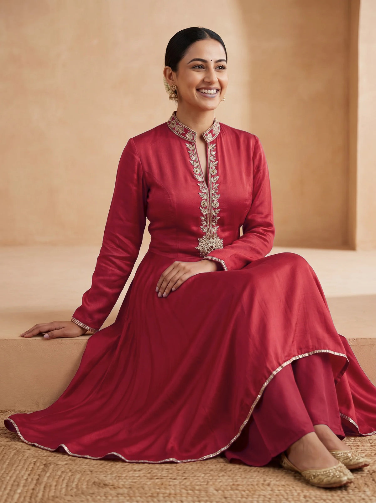 Red frock with drape pants, seated