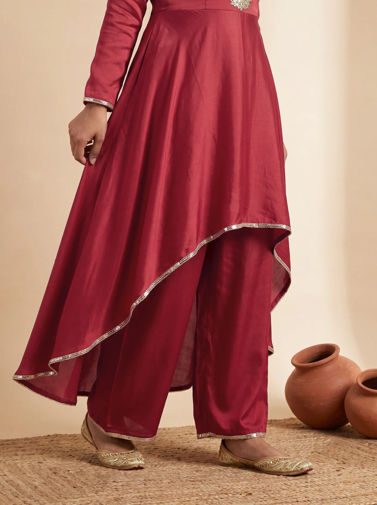 Red frock, asymmetric hem over the drape pants