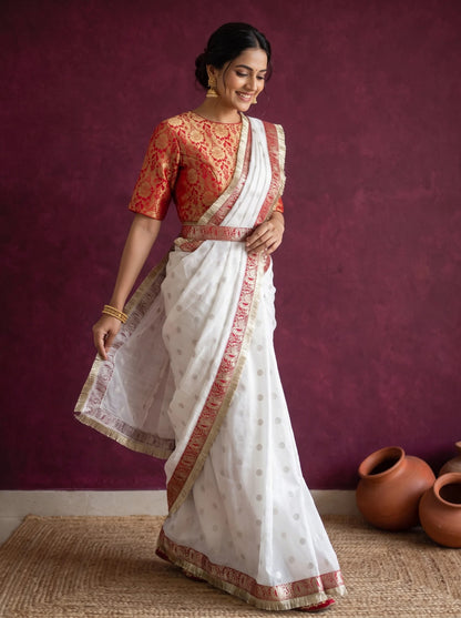 White chanderi saree, pallu held out