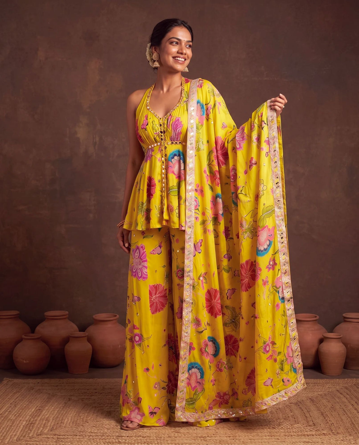 Yellow printed crepe suit, dupatta held open