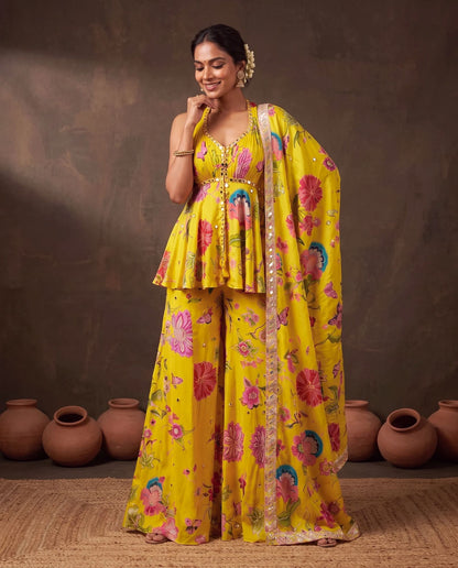 Yellow printed crepe suit, peplum kurta and palazzo